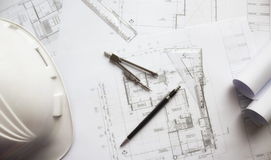 Image of engineering objects on workplace top view.Construction concept. Engineering tools.Vintage tone retro filter effect,soft focus(selective focus)